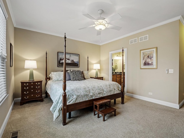 carpeted bedroom with connected bathroom, ornamental molding, and ceiling fan