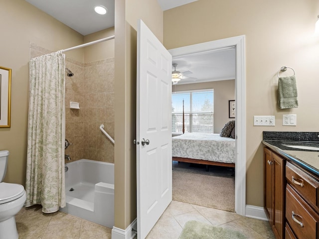 bathroom with ceiling fan, tile patterned floors, toilet, and vanity