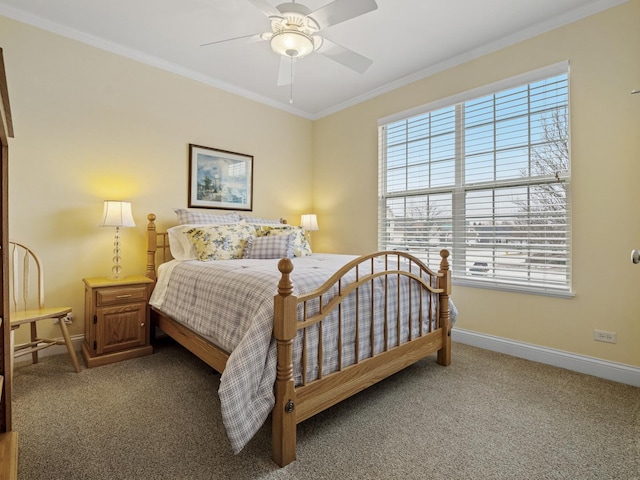 carpeted bedroom featuring ornamental molding and ceiling fan