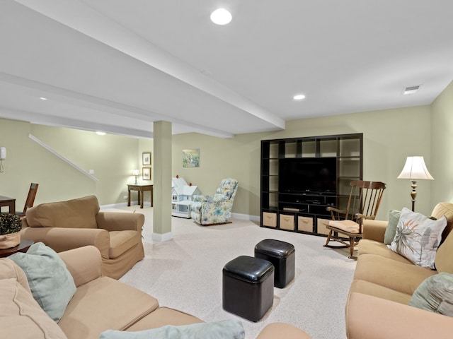 living room featuring carpet flooring and beam ceiling