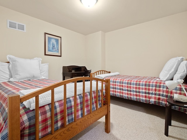 bedroom featuring carpet