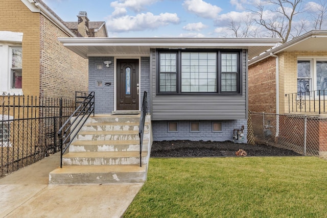 property entrance with a yard