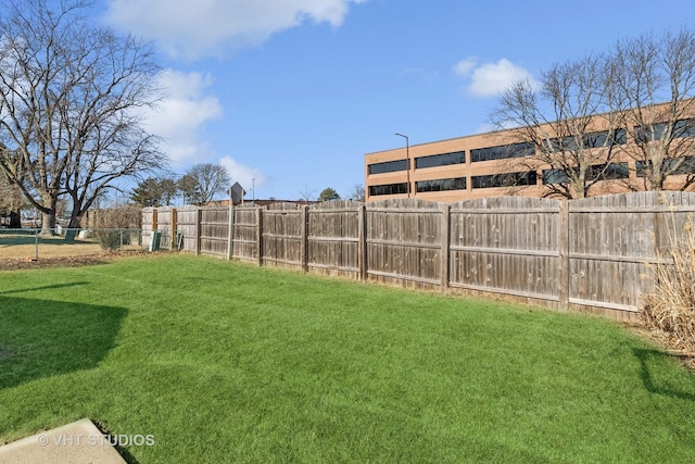 view of yard with fence