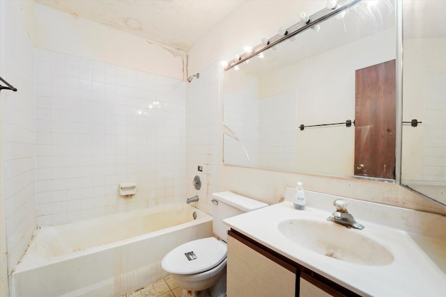 full bathroom with vanity, tiled shower / bath combo, and toilet