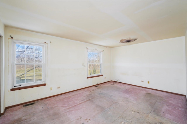 empty room featuring plenty of natural light