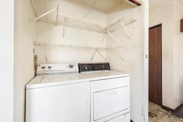 laundry room with washer and clothes dryer