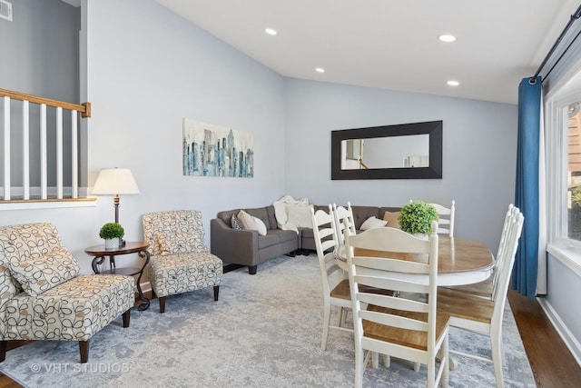 dining area with lofted ceiling