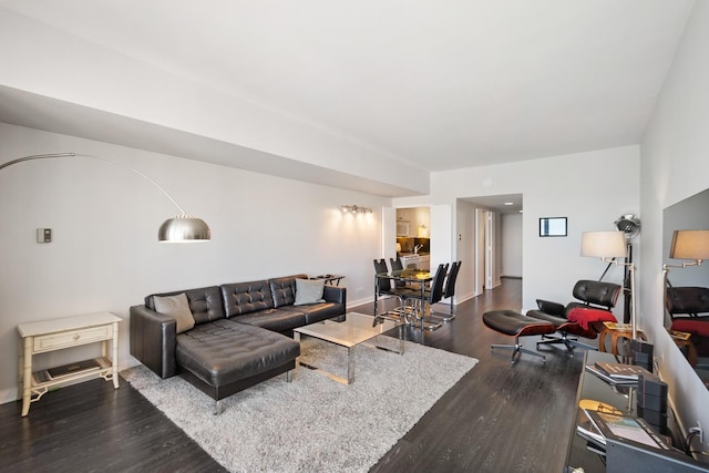 living room featuring dark hardwood / wood-style flooring