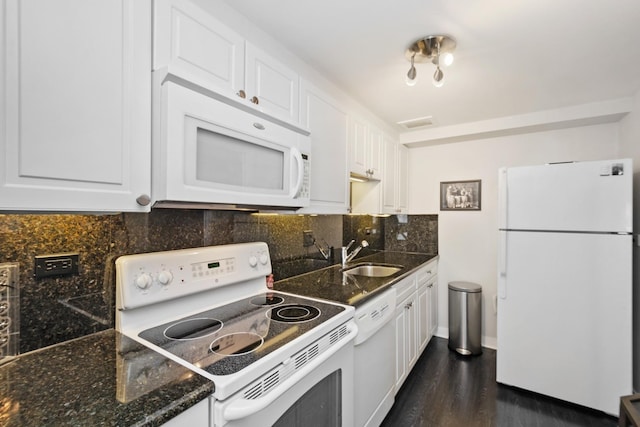 kitchen with white appliances, sink, backsplash, dark wood-type flooring, and white cabinets