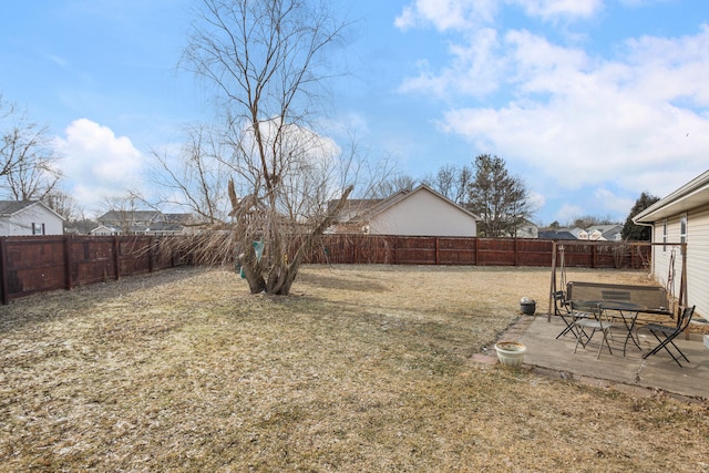 view of yard featuring a fenced backyard