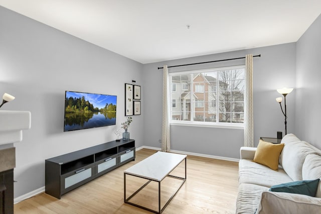 living room with light hardwood / wood-style floors