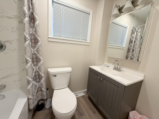 full bathroom with vanity, wood-type flooring, shower / tub combo with curtain, and toilet