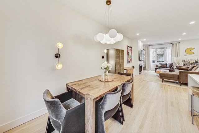 dining space featuring light hardwood / wood-style flooring