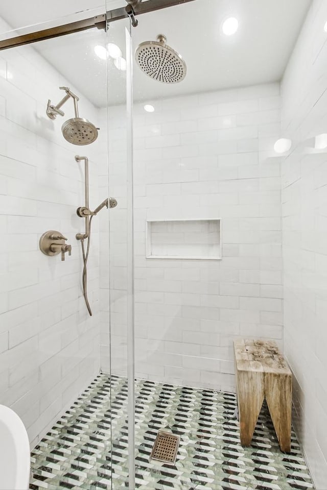 bathroom featuring walk in shower