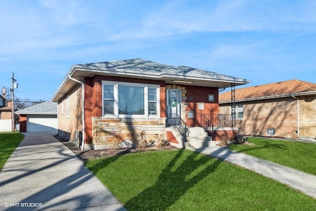 view of front of property with a garage, an outdoor structure, and a front lawn