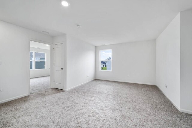 foyer entrance featuring baseboards and light wood-type flooring