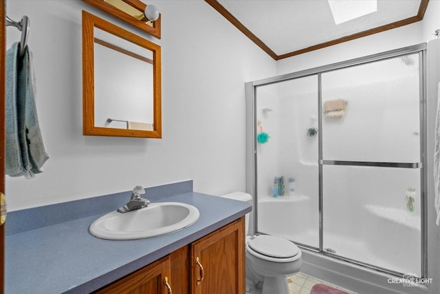 bathroom with walk in shower, toilet, vaulted ceiling, ornamental molding, and vanity