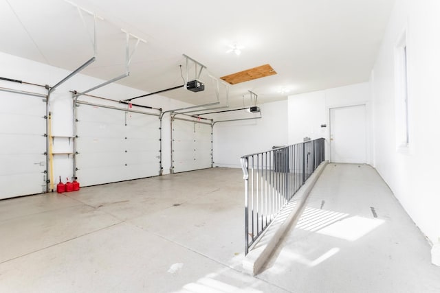 garage featuring a garage door opener