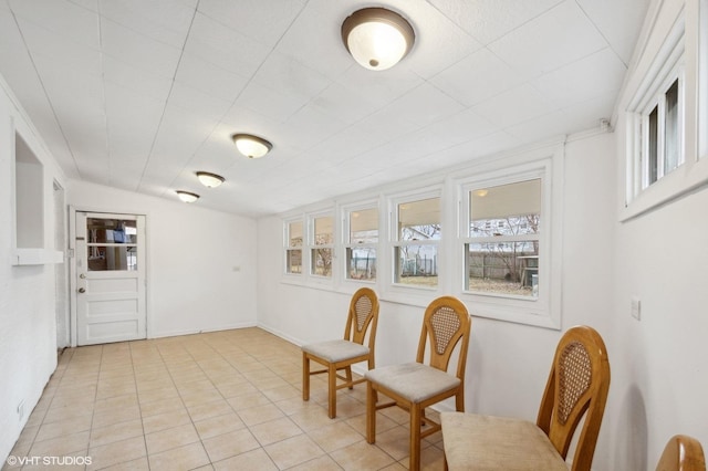 living area with light tile patterned floors