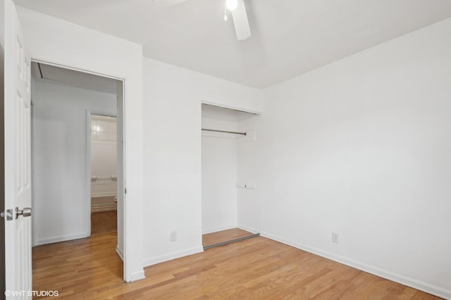 unfurnished bedroom featuring a closet, ceiling fan, and light hardwood / wood-style flooring