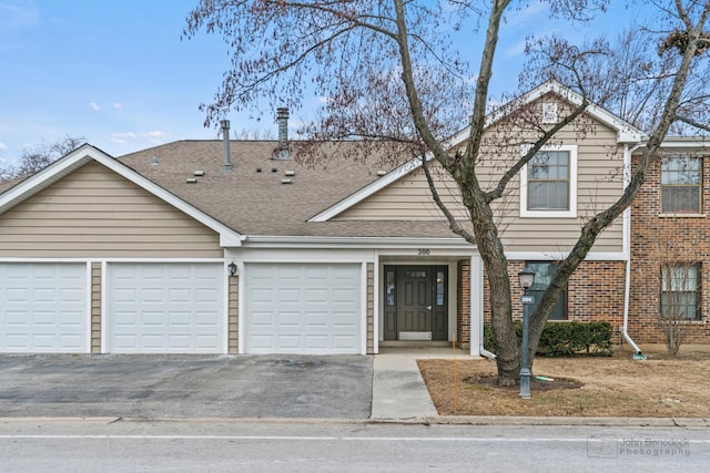 view of front of home featuring a garage