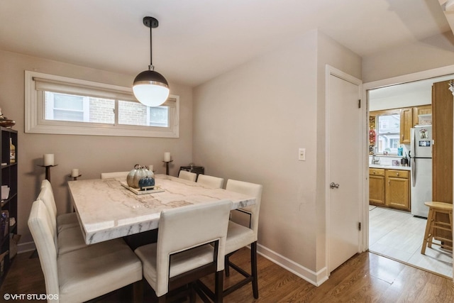 dining space featuring light hardwood / wood-style flooring