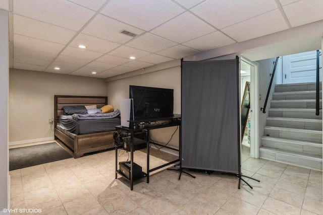 bedroom with a drop ceiling