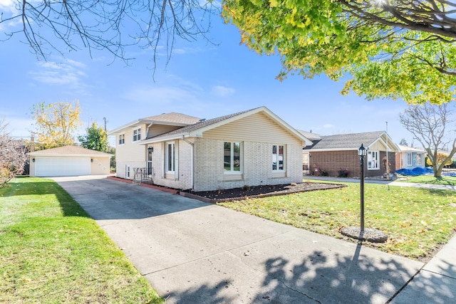 single story home featuring a garage, an outdoor structure, and a front lawn