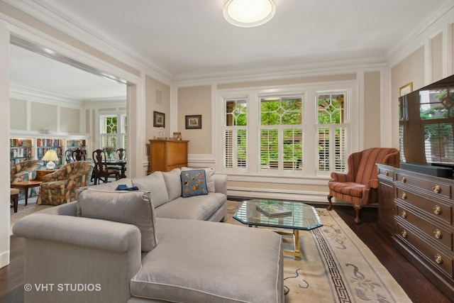 living room with ornamental molding and dark hardwood / wood-style flooring