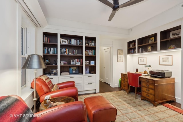 home office featuring built in features and ceiling fan