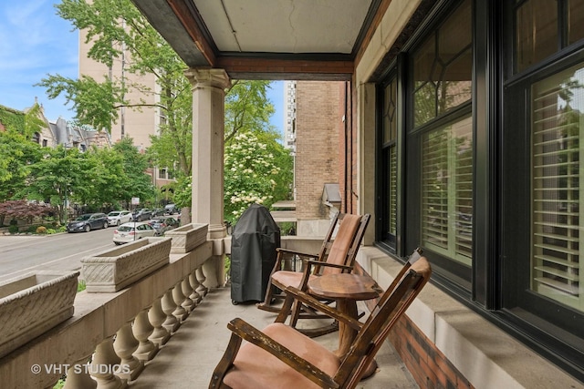 balcony with grilling area and covered porch