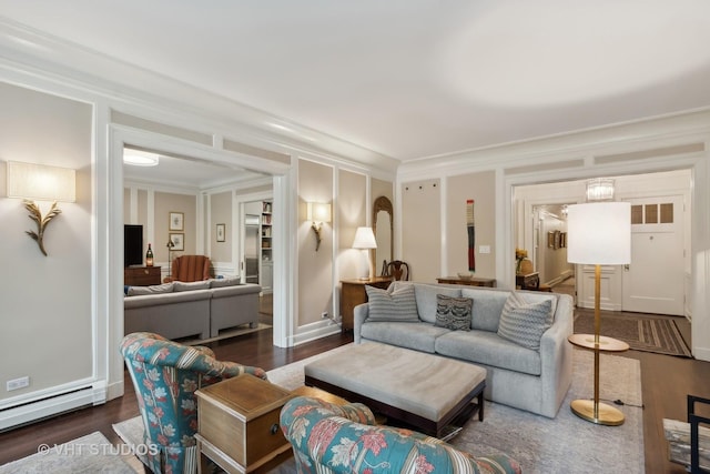 living room featuring a baseboard heating unit, ornamental molding, and dark hardwood / wood-style floors