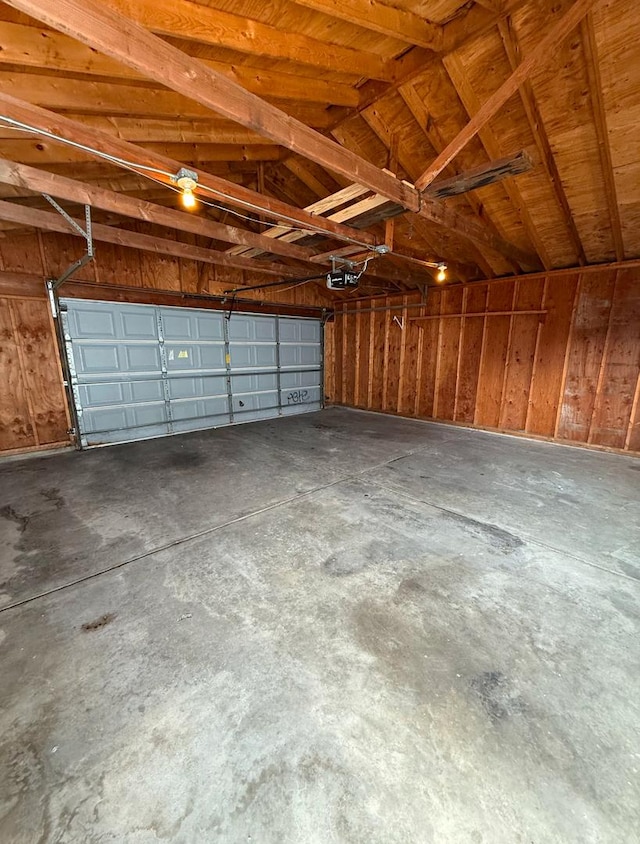 garage featuring a garage door opener