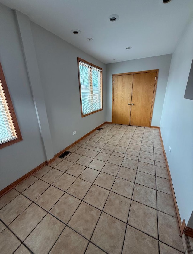 unfurnished bedroom featuring a closet