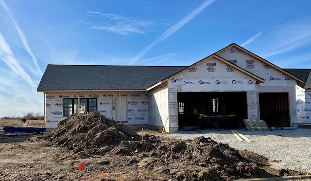 property under construction with a garage