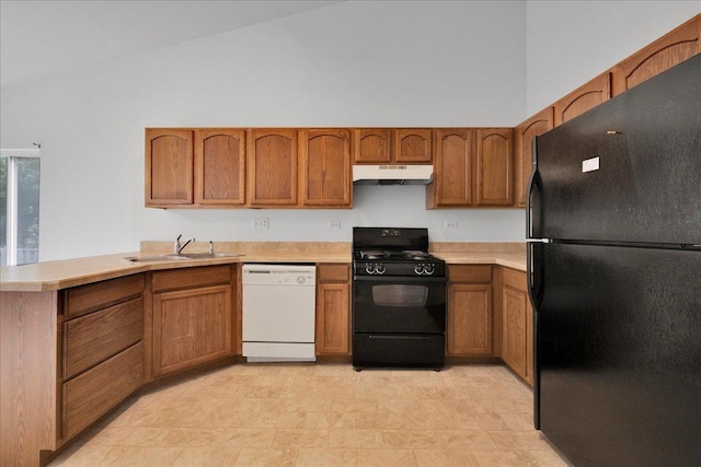 kitchen with high vaulted ceiling, kitchen peninsula, sink, and black appliances