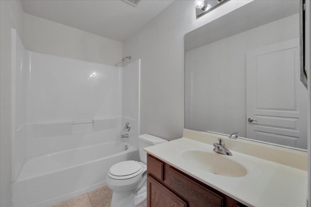 full bathroom with vanity, tile patterned floors, toilet, and shower / washtub combination