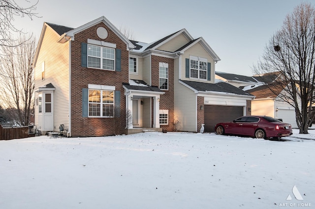 view of front of home with a garage