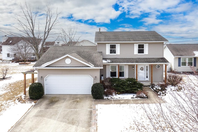 view of front of property with a garage