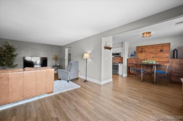 living room with light wood-type flooring