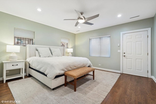 bedroom featuring wood-type flooring and ceiling fan