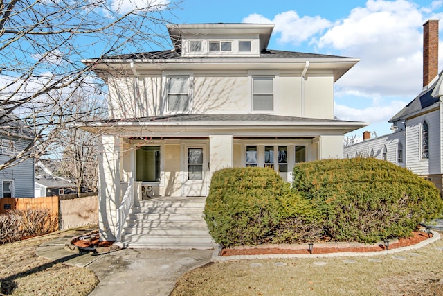 view of front of property featuring covered porch