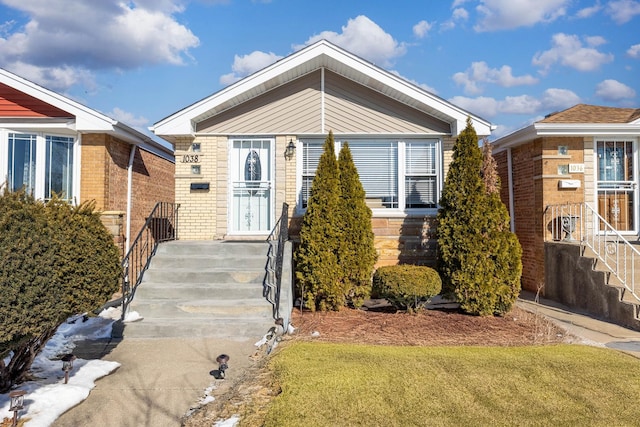 view of front of house with brick siding