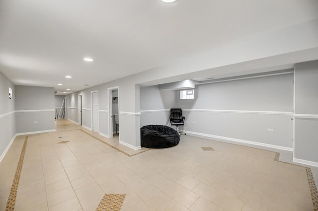 interior space featuring recessed lighting and baseboards