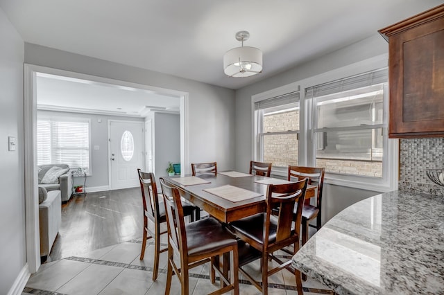 dining space with baseboards