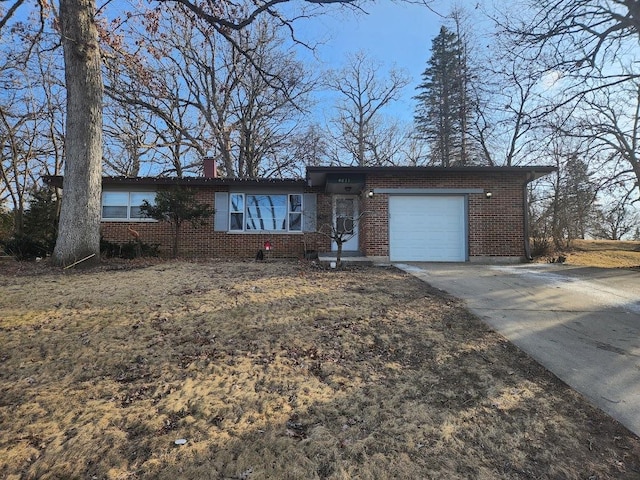 ranch-style house featuring a garage