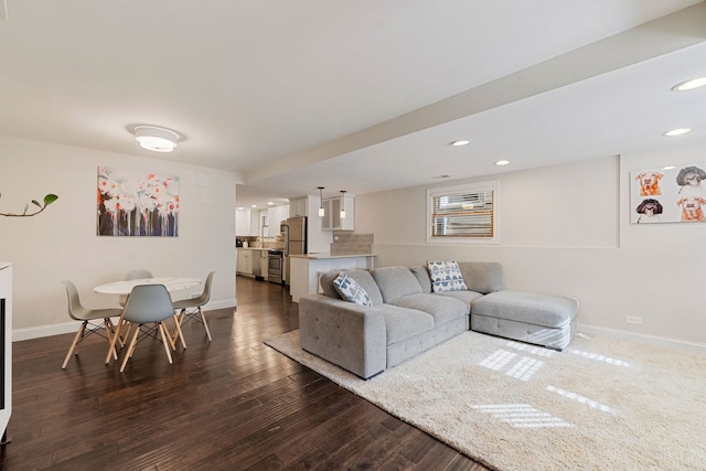 living room featuring dark hardwood / wood-style floors