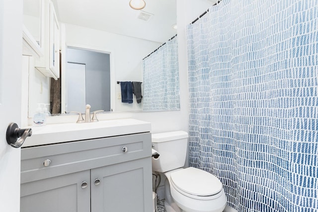 6402 N Shore Ave, Spring Grove, IL 60081 - full bathroom with toilet, vanity, and a shower with curtain
