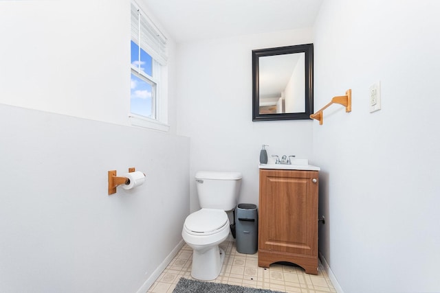 6402 N Shore Ave, Spring Grove, IL 60081 - half bath with toilet, baseboards, and vanity
