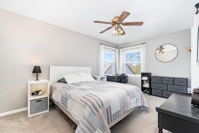 6402 N Shore Ave, Spring Grove, IL 60081 - bedroom featuring light carpet, a desk, baseboards, and a ceiling fan